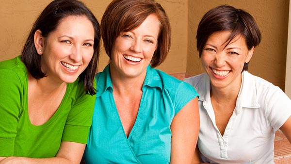 three friends with beautiful smiles